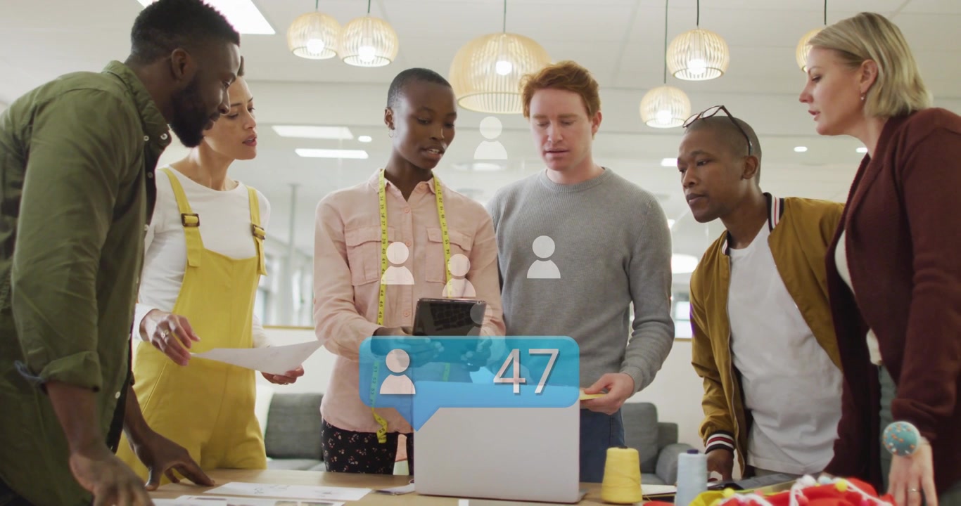 Design team woman showing tablet as social bubble popping up and counting, team tracking engagement