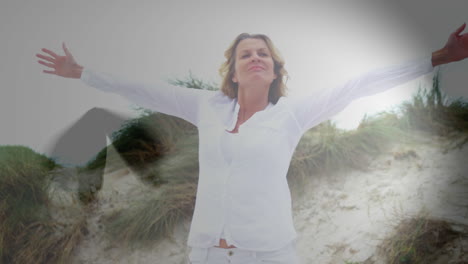 woman doing yoga on the beach