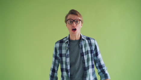 surprised man in plaid shirt
