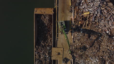 Aerial-birds-eye-overhead-top-down-footage-of-transporting-separated-material-for-recycling.-New-York-City,-USA