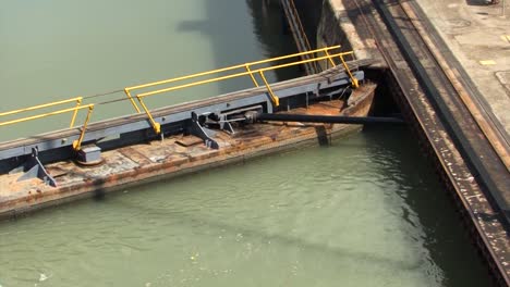 Upper-view-of-the-Hydraulic-gates-of-Miraflores-Locks-chamber,-Panama-Canal