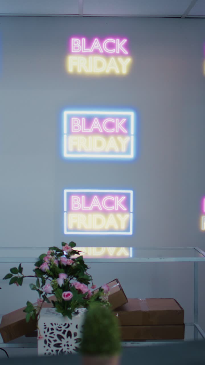 Vertical video Black friday banners on clothes rack