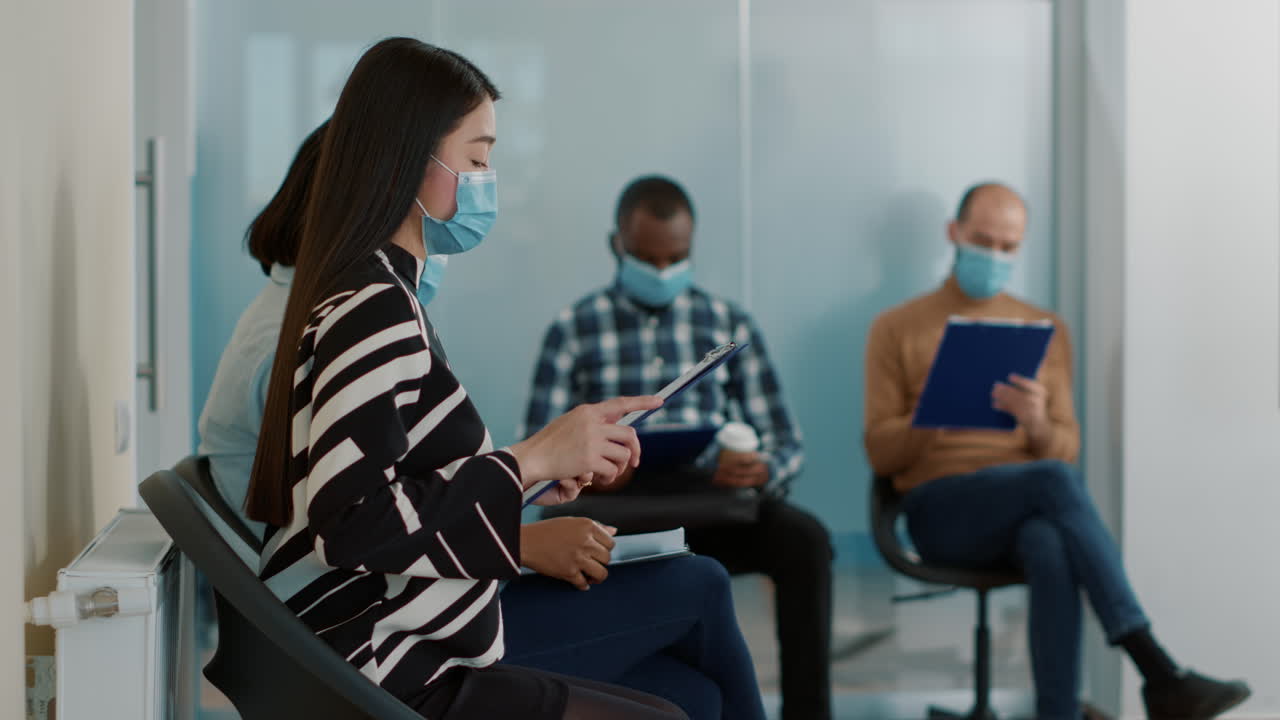 HR worker asking female applicant to join job interview meeting