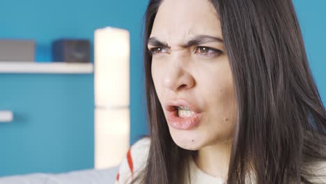 angry young woman shouting, screaming.