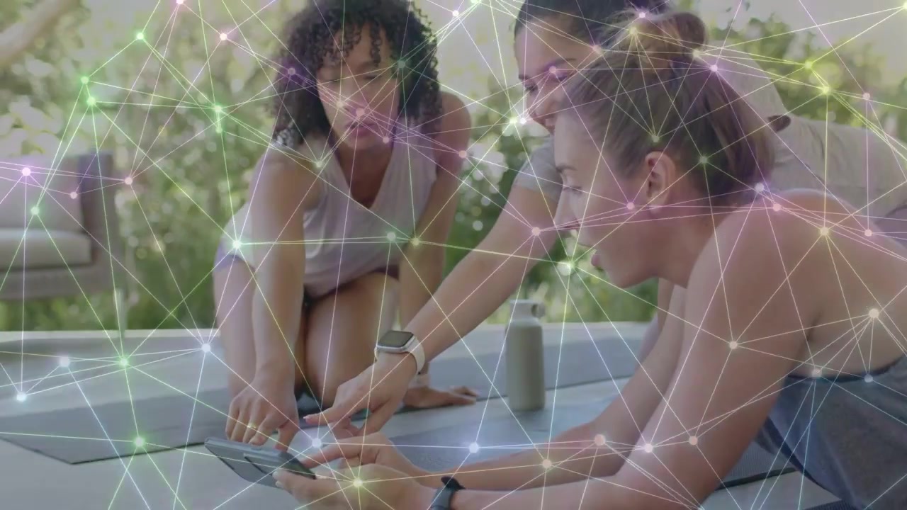 Student scrolling phone and showing mat, trainer pointing, planning yoga with network overlay