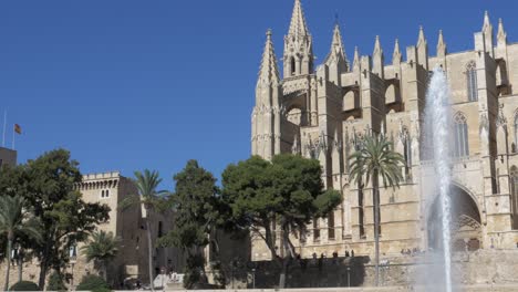 Exterior-View-of-Cathedral-of-Santa-Maria-of-Palma-With-Fountain-in-Foreground