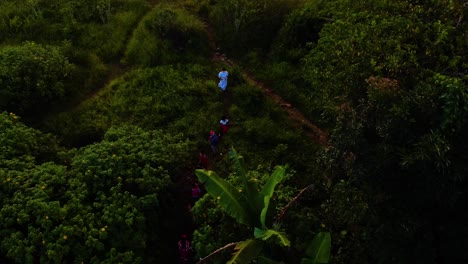 Drone-shot-of-an-tribal-elder-followed-by-youth