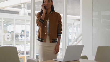 young woman working in a creative office