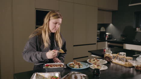 woman eating sushi at home