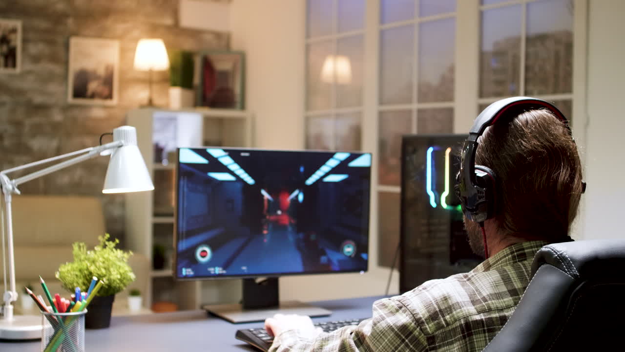 Man playing video game on computer