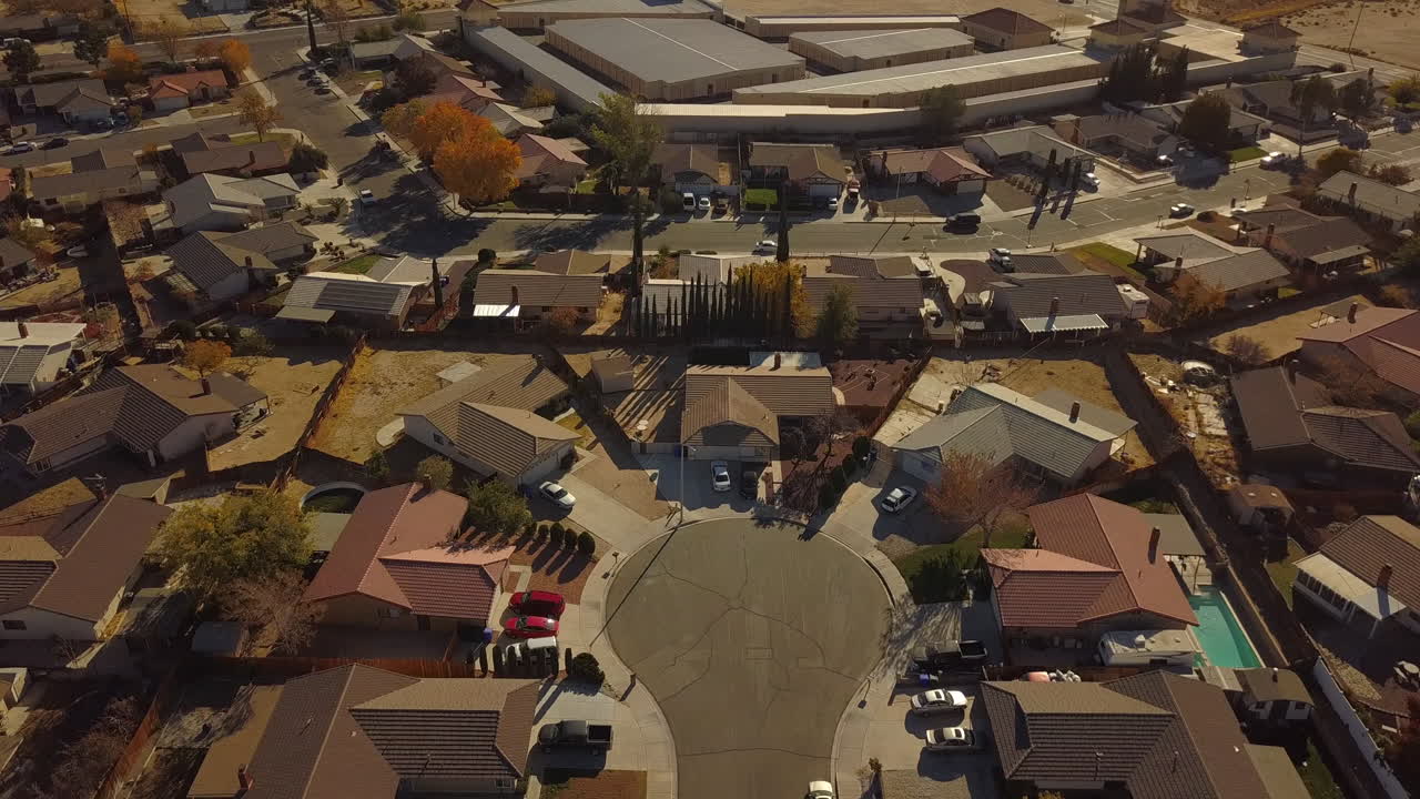 Drone flyover over a suburban neighborhood in the High Desert town of Victorville, CA