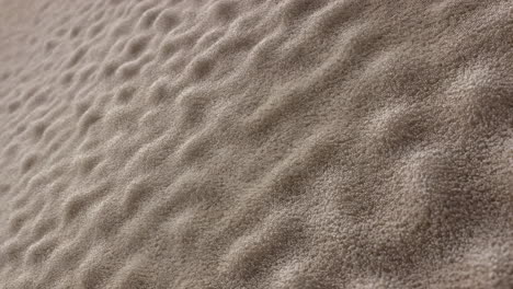 close-up of a textured beige surface with bumpy, wavy patterns