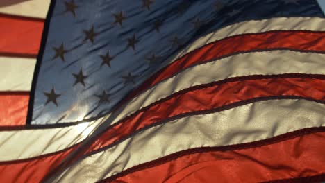 Closeup-of-American-flag-in-sunlight-in-cinematic-slow-motion