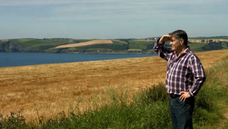 farmer looking out over his land