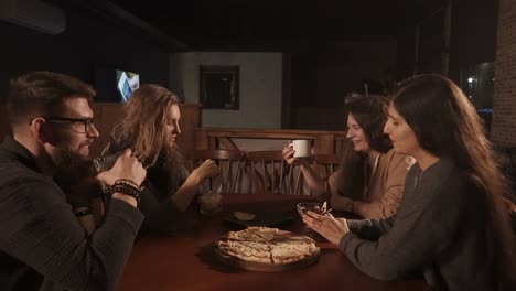 friends enjoying dinner at a restaurant