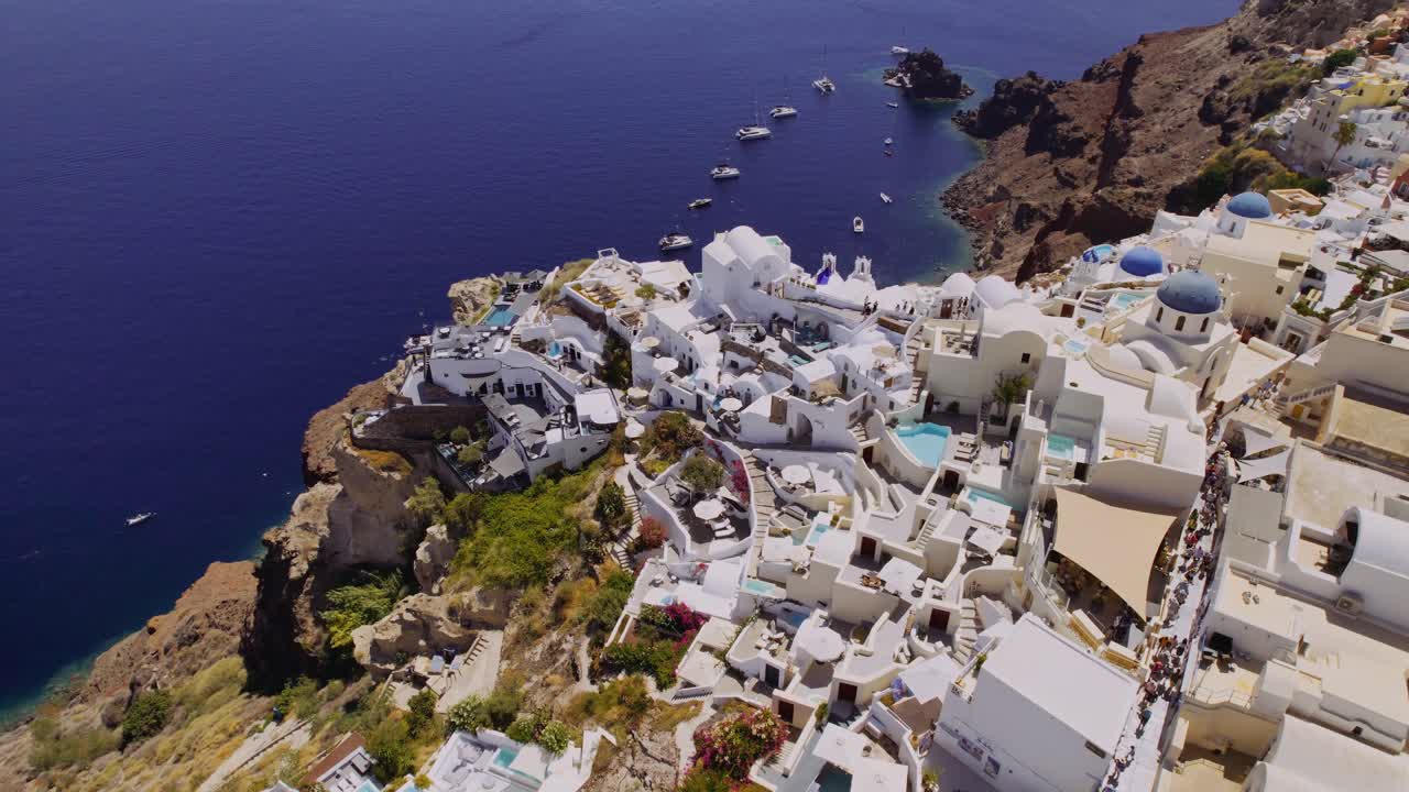 Aerial View of Oia Village and Aegean Sea in Santorini, Greece