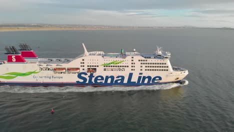 drone shot of cruise ship sailing.