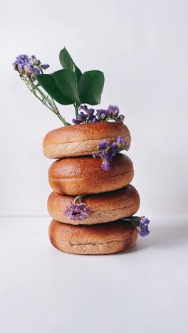 stack of bagels with flowers