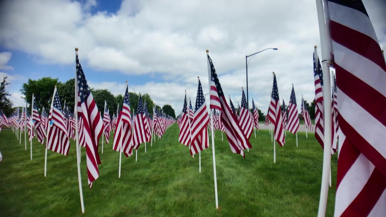 Gimbal shot of field of American flags in field in Westerville, Ohio