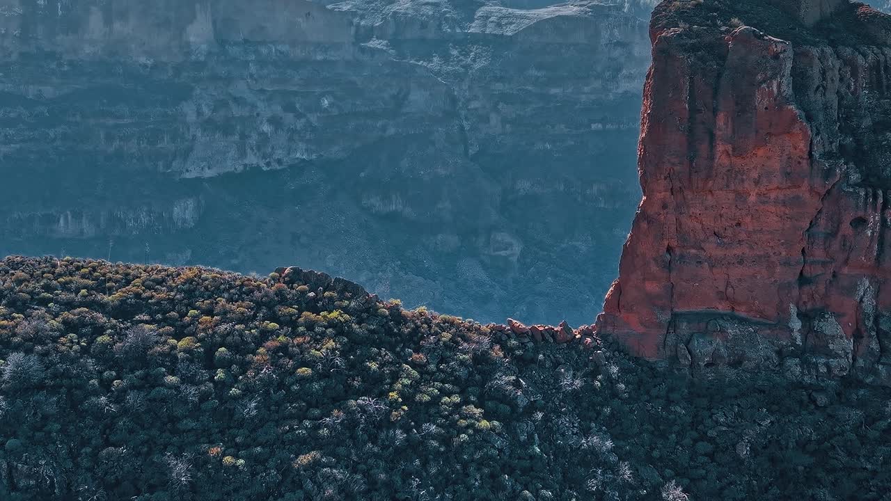 Exploring the rocky landscape of Gran Canaria from an aerial view