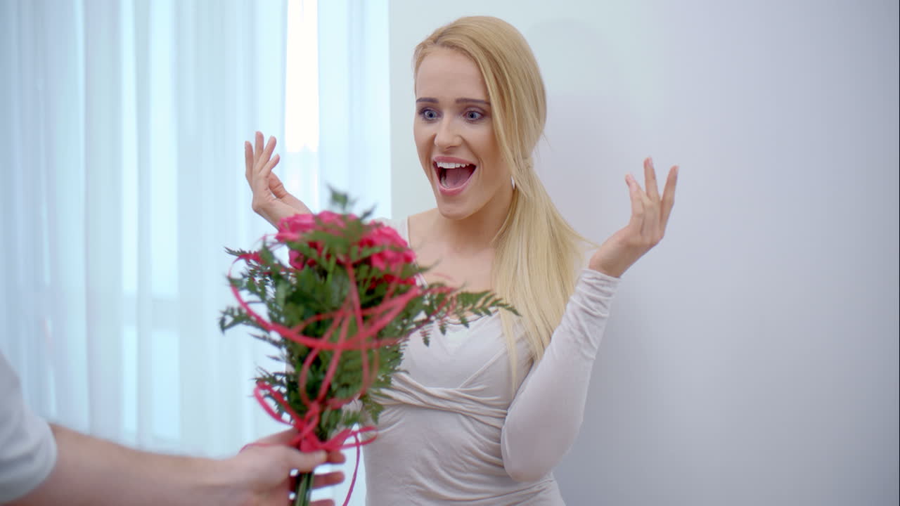 Pretty Girl Surprised with Bouquet of Flowers