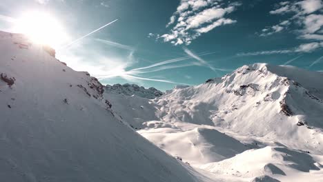 north pole winter landscape with white snow-covered mountains, aerial