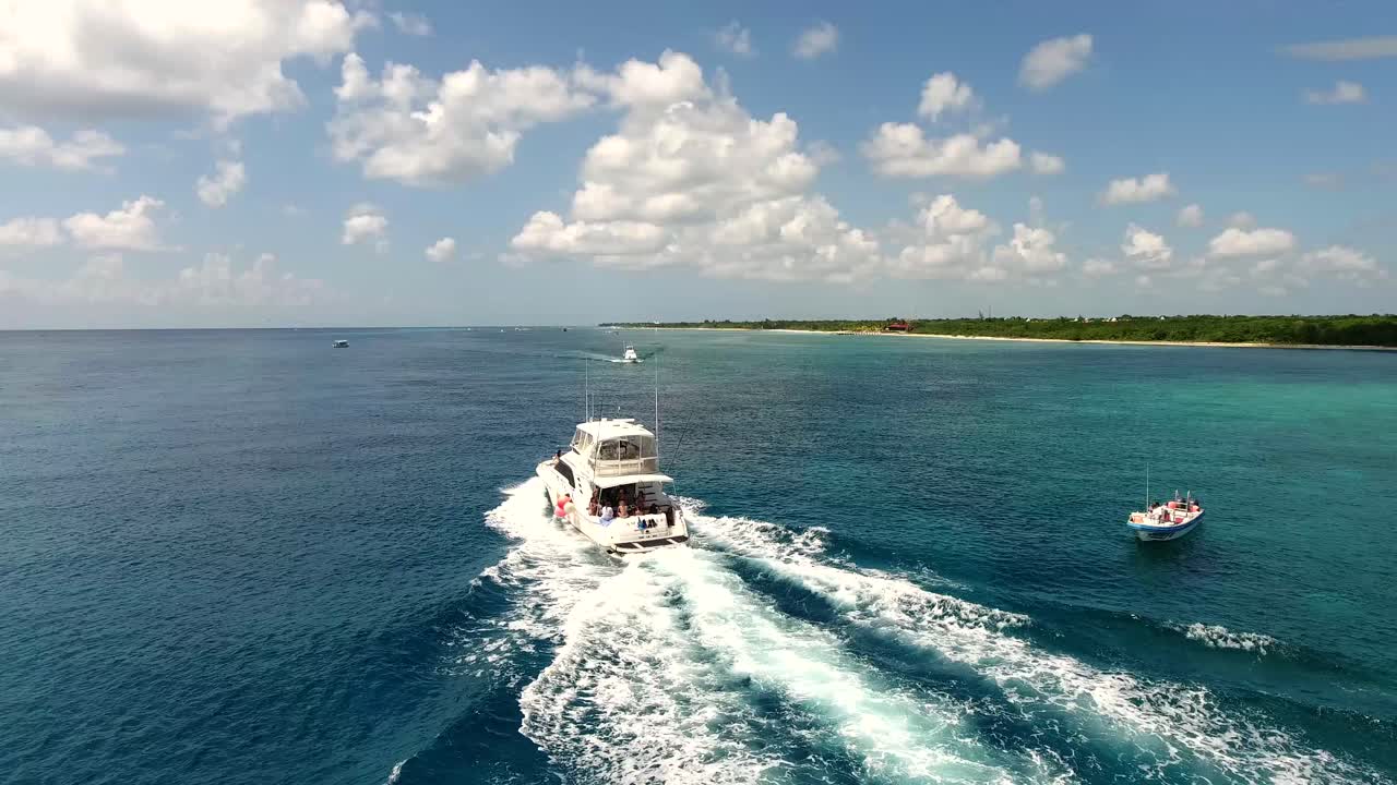 Aerial view of caribbean sea coast and fishing boats. Cozumel Mexico.