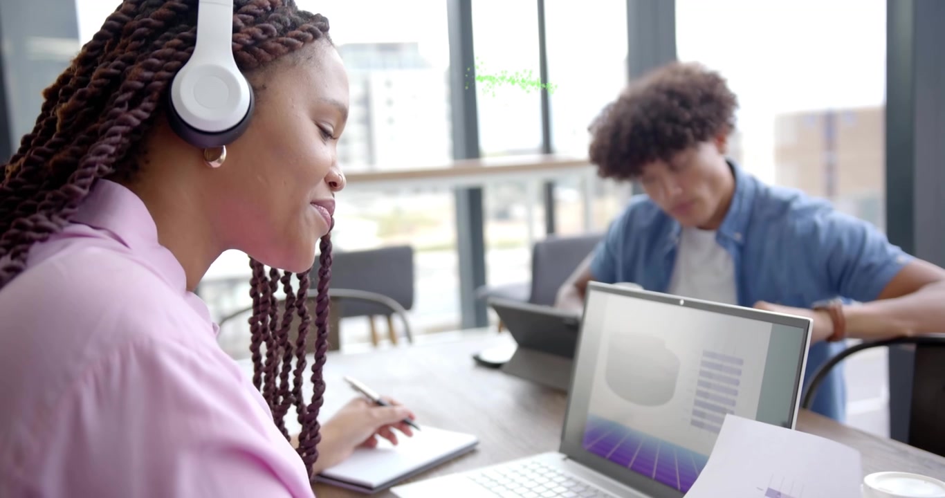 woman putting on headphones initiating green magenta particle swirl around business colleagues