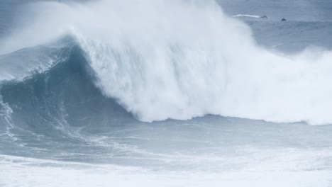 slow motion wave in nazaré, portugal