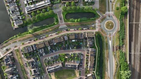 unique layout of housing projects in weesp between canals, aerial top-down