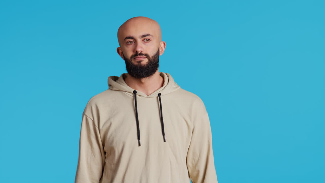 Middle eastern man acting casual on camera