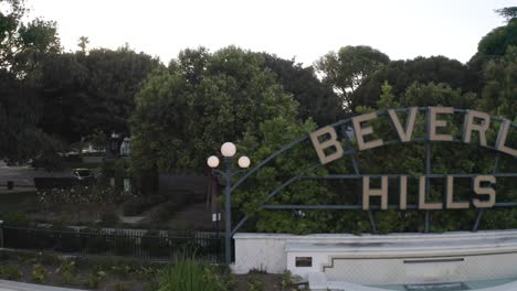 aerial shot of beverly hills sign during sunset