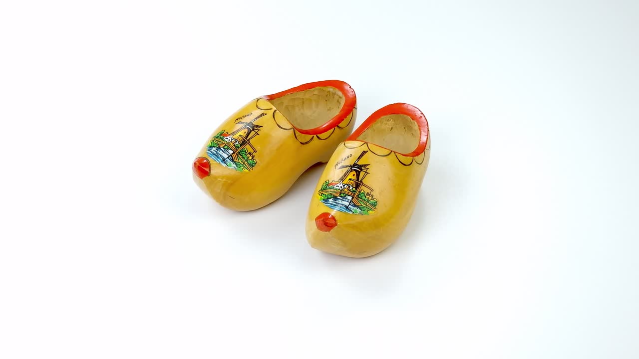 Clogs on white background 4K