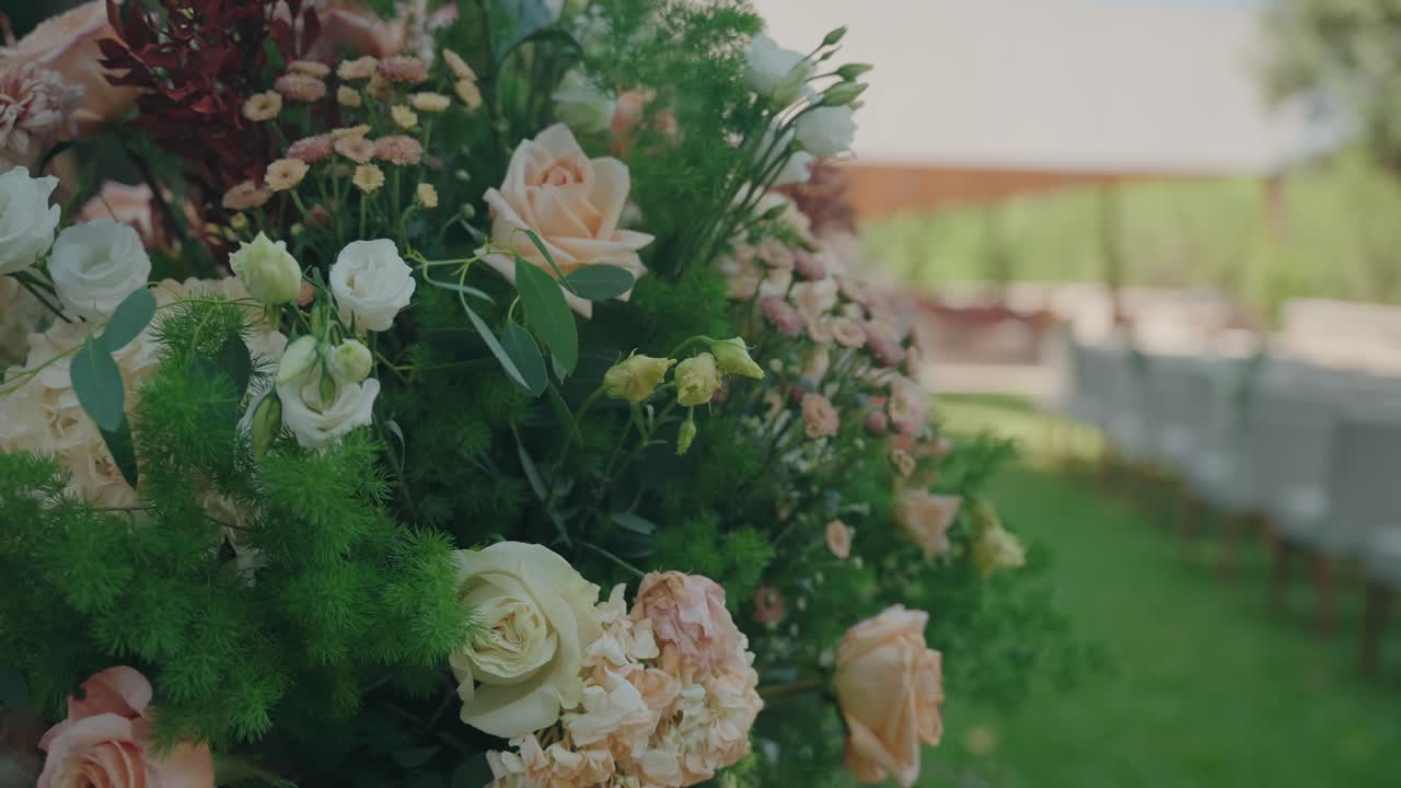 Delicate pastel floral arrangement in soft natural outdoor light