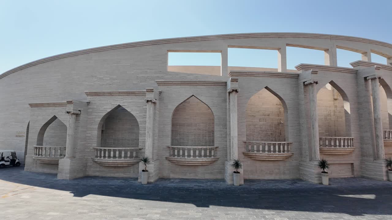 Ancient-inspired building exterior in a plaza