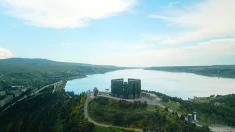 aerial view of the chronicle of georgia monument overlooking tbilisi sea