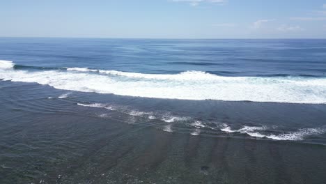 Waves-rolling-in-off-the-coast-of-Nusa-Dua-in-Bali,-Indonesia