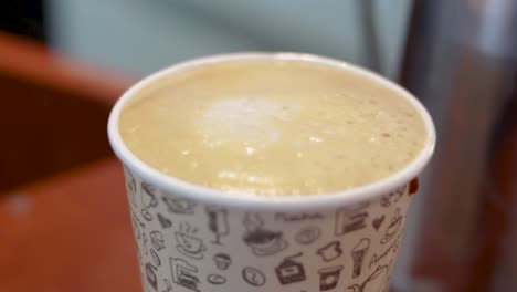 close up shot of disposable coffee cup