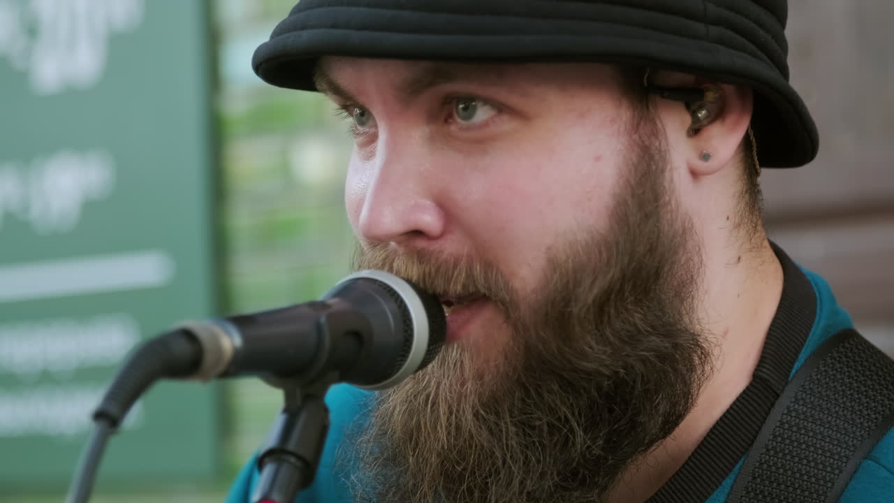 Male Musician Performing Song Outside