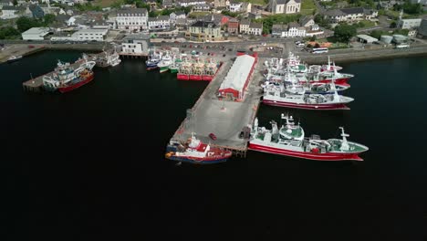 overhead aerial video of killybegs harbour on the wild atlantic way in county donegal, ireland. filmed in 4k, 60fps and with rec709 color.