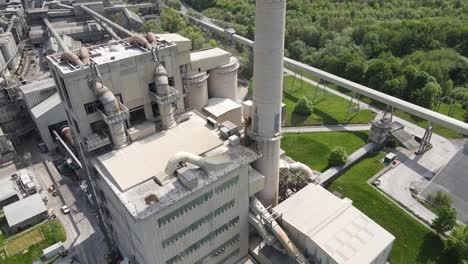 aerial drone flight with a birdseye view around the main building of breedon hope cement works peak district