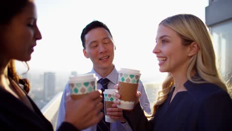 multi ethnic business team break time on rooftop