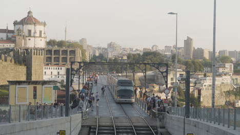 tram on a bridge in a city