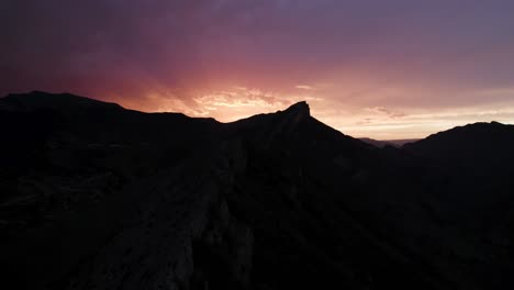 sunset over mountain peaks