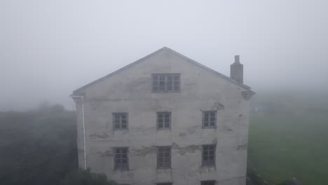 abandoned house in fog