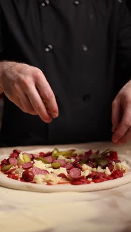 chef preparing a pizza