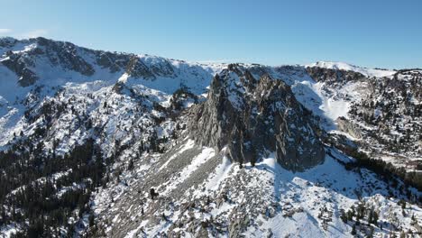 Drone-Flying-Close-Into-Snowy-Mountains-in-Mammoth-Lakes-California-Winter-Time