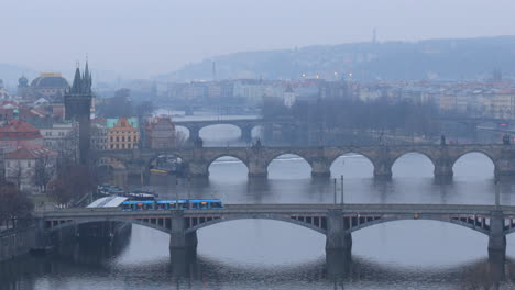 Looking-over-the-rooftops-of-Prague-and-the-Charles-Bridge,-Czech-Republic