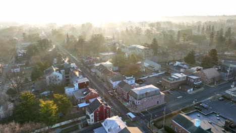 aerial establishing shot of historic small town in usa