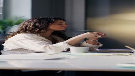 woman in office during a phone call